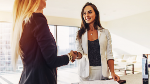 College of Real Estate CORE Why Are Women in Real Estate Less Likely To Quit Than Men Shaking Hands