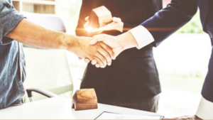 College of Real Estate CORE Building Relationship with Other Real Estate Agents Hand Shake
